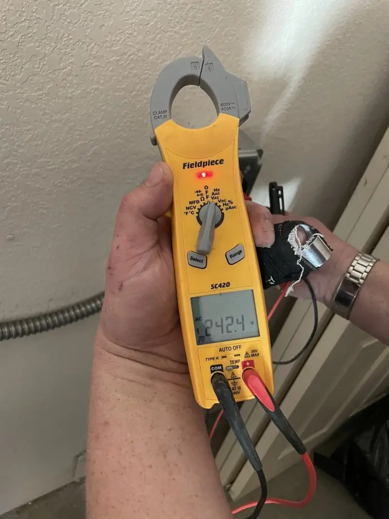 Voltage testing with clamp meter during Generator Installation in Bellevue